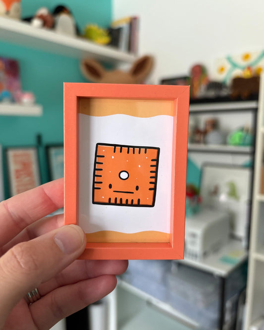 Square Cheese Cracker 2x3 Print with Orange Magnetic Frame